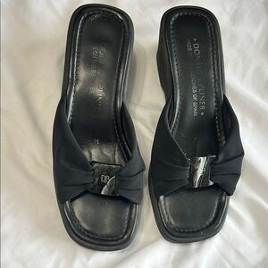 Donald J. Pliner Black Mules Sleek and Stylish